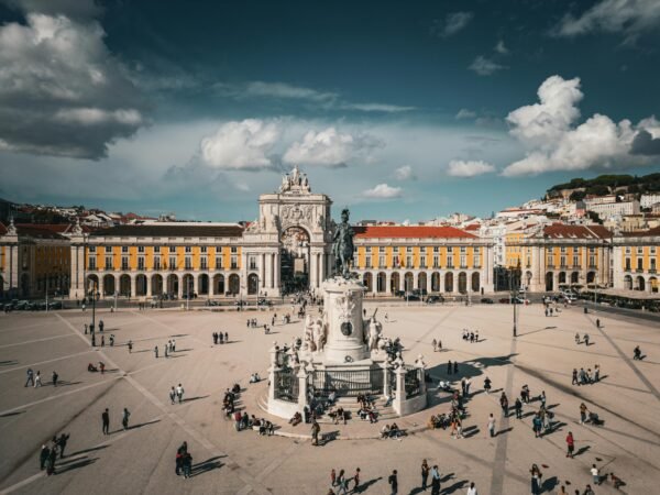 Stunning aerial view of Praça do Comércio in Lisbon, Portugal showcasing its architecture and vibrant atmosphere.